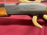 Remington model 1100,
12 ga, - 6 of 13
