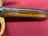 Remington model 1100,
12 ga, - 11 of 13