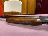 Remington 20 ga. SKEET
B, MOD. 1100 - 7 of 8