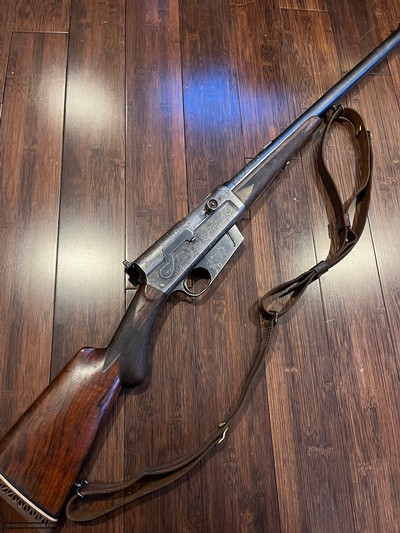 EXPERT grade Remington Model 8 Auto loading rifle in 300 Savage
Joseph Loy Engraved GEM.