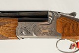 Caesar Guerini Summit Sporting 12ga 32in Adj Comb LH - 1 of 11