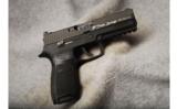 Sig Sauer P250 .45 ACP - 1 of 2