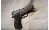 Sig Sauer P220 .45 ACP - 1 of 2