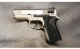 Smith & Wesson Mod 4006 .40 S&W Perf. Center - 2 of 2