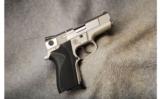 Smith & Wesson Mod 4006 .40 S&W Perf. Center - 1 of 2
