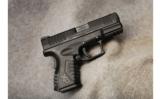 Springfield XDM-99mm Luger - 1 of 2