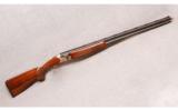 Beretta 682 Gold E Sporting in 12 gauge w/ extra barrels - 1 of 9