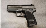 H & K USP Compact 9mm Luger - 2 of 2