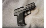 Heckler & Koch ~ USP Compact ~9mm Luger - 1 of 2