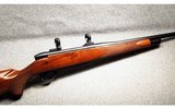 Weatherby ~ Mark V ~ 7MM Remington Magnum - 1 of 7