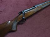 WINCHESTER MODEL 70 - PRE-64 - 220 SWIFT - 26-IN. SPORTER WEIGHT BARREL - MADE IN 1957 - EXCELLENT - 1 of 15
