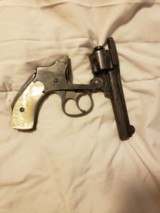 Smith and Wesson safety hammerless.321st model