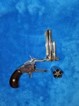 Smith and Wessonmodel 1 1/2 .32 rim firebreak- top revolver revolver - 4 of 7