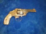Smith and Wesson. .38 second model safety hammerless revolver - 1 of 7