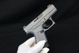 Like New Glock 42 380 Factory Gray w/ box & papers 3 dot Tridium Night Sights - 2 of 20