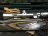 Mossberg 4x4 Ducks Unlimited 300 win mag with scope - 4 of 4