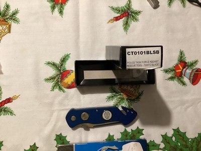 Colt police Force Rescue Tool, with carbide glass break and seat belt cutter.