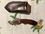 Small belt sheath knife. SS blade with Ironwood scales
