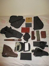 HOLSTERS
AND
CARTRIDGE
HOLDERS - 1 of 2
