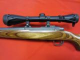 Ruger M77/22 22 Magnum Stainless/Laminate w/ Leupold
- 4 of 6