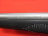 Winchester Model 70 Stainless/Synthetic 7mm STW w/ Boss & Leupold
- 7 of 8