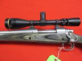 Remington Model 700 *****
LEFT
HAND
***** Stainless/Laminate 338 Ultra Mag 26" w/ Leupold - 5 of 7