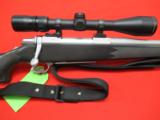 Browning A-Bolt Stainless w/ BOSS 300 Win Mag with B&L Elite 4200 Scope - 1 of 8