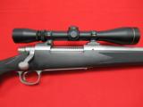 Remington Model 700 Stainless/Synthetic 30-06 w/ Leupold - 1 of 7