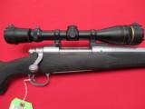 Remington Model 700 Stnls/Syn 7mm Rem 24" w/ Leupold - 1 of 7