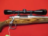 Remington Model 700 Mountain Stainless/Laminate 7mm-08 w/ Leupold - 1 of 7