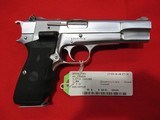Browning Hi Power 9mm 4.5" Satin Chrome w/ Crimson Trace - 1 of 2