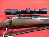 Remington Model 700 Classic 375 H&H w/ Weaver Grand Slam - 1 of 8