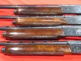 FOUR GUN SET of Remington 1100 F Grades (12/20/28/410) w/ CONSECUTIVE SER. #s - 6 of 14