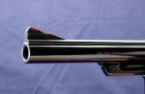 Smith & Wesson 125th Anniversary Model 25-3 chambered in .45 lc and manufactured in 1977.
- 5 of 7
