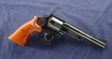 Smith & Wesson 125th Anniversary Model 25-3 chambered in .45 lc and manufactured in 1977.
- 1 of 7