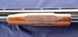 Winchester Model 12
chambered in 12ga
and manufactured in 1958 barrel cut to 27