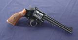 Smith & Wesson K-38 5 screw chambered in .38spl and manufactured in 1950. - 1 of 6