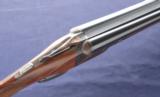 Parker Reproduction DHE chambered in 20ga 2-3/4”
in its factory Leather case with outer sleeve. - 7 of 14