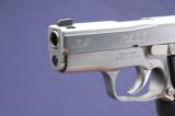 Kahr K9 Elite 03 chambered in 9mm with Crimson Trace laser grips. - 4 of 5