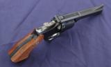 Smith & Wesson Model 15-6 K-38 Masterpiece chambered in .38 spl with a 4” heavy barrel and box. - 2 of 7