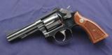 Smith & Wesson Model 15-6 K-38 Masterpiece chambered in .38 spl with a 4” heavy barrel and box. - 6 of 7