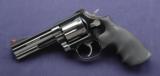 Smith & Wesson 586-4 chambered in .357 mag & .38 S&W spl. Like New- 6 of 6