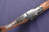 Parker V grade, on a 1-1/2 frame, chambered in
12ga 2-3/4” and manufactured in early 1907. - 5 of 13