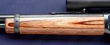 Winchester 9422 chambered in .22 lr. 2.5 X 7 Weaver and laminated wood stock. - 10 of 11