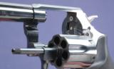 Smith & Wesson model 10-14 chambered in .38 spl
+ P. and manufactured with the lock. - 4 of 6