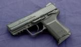 HK 45C chambered in .45acp and is like new in box with 2 mags - 5 of 5