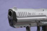HK 45C chambered in .45acp and is like new in box with 2 mags - 4 of 5