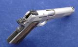 Smith & Wesson Stainless steel, SW1911 chambered in .45acpand manufactures in 2008. - 2 of 7