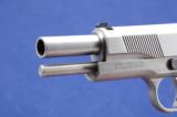 Smith & Wesson Stainless steel, SW1911 chambered in .45acpand manufactures in 2008. - 5 of 7