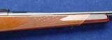 Weatherby Mark V Deluxe chambered in .257wby manufactured in Japan with its factory box - 8 of 13